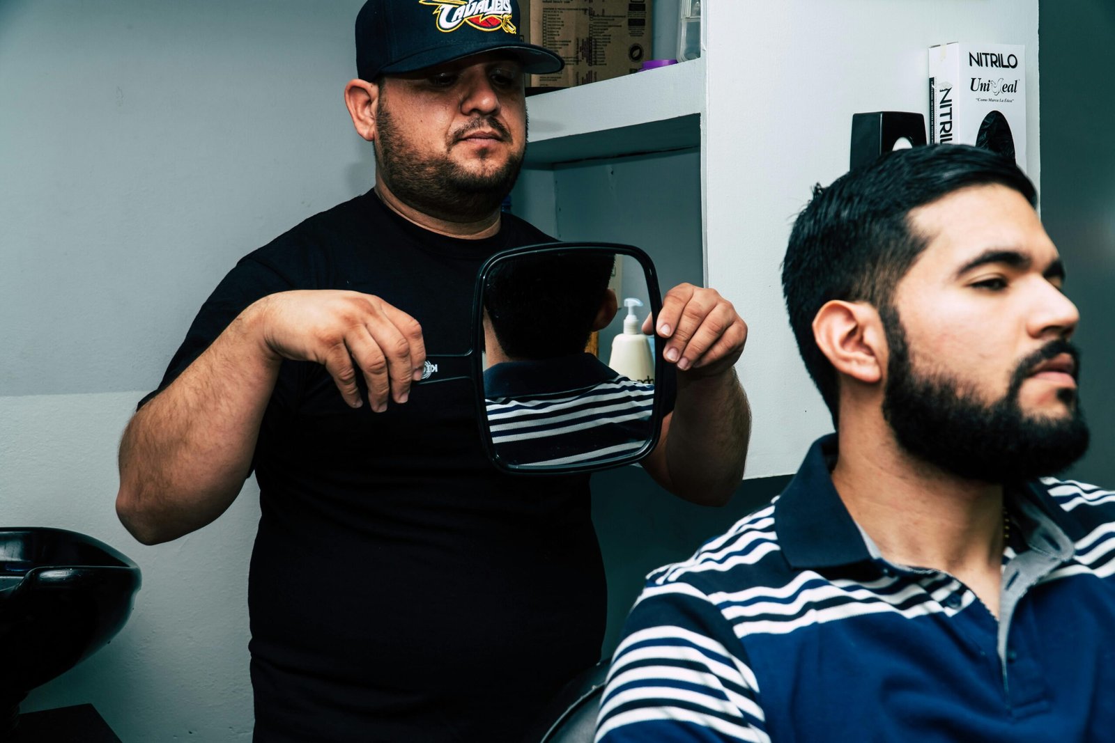 Interior of a barbershop showcasing various hair products