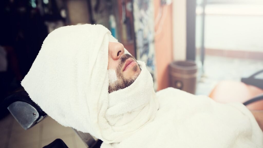 How Does the Smell of Talc and a Hot Towel Shave Shape the Experience?